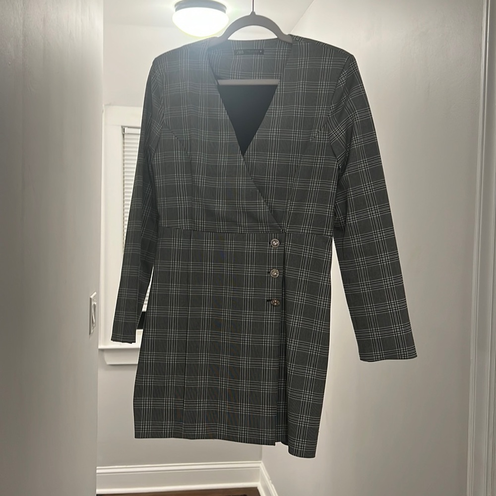 Above knew-length plaid dress
